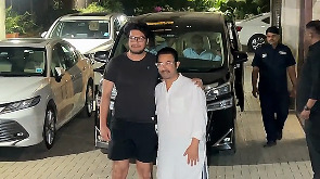 Aamir Khan with son Junaid outside their house