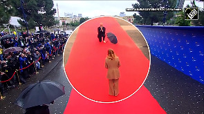 Watch: Albanian PM puts aside his umbrella, kneels in front of Georgina Meloni