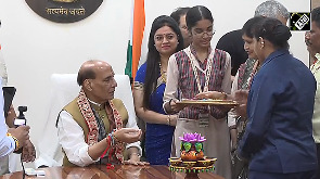 Women tie Rakhis to Rajnath Singh
