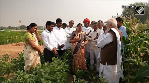 PM Modi interacts with farmers as he participates in a special Krishi programme