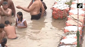 Devotees take holy dip in Saryu River on 'Ashadha Amavasya'