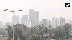 Mumbai experiences light showers and fog