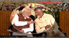 Light moments between Modi and Naidu during the rally in Andhra Pradesh