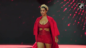 Malaika Stuns in Fiery Red Cutout Dress, Rules the Ramp Again