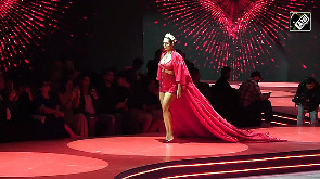 Malaika Stuns in Fiery Red Cutout Dress, Rules the Ramp Again