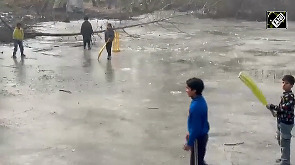 Cricket on ice! Frozen pond turns playground for kids in Sopore