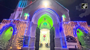 Devotees offer midnight mass prayers at St Anselm Church, Ajmer