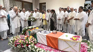 Home Minister Amit Shah with Gujarat CM Bhupendra Patel pay tribute to former CM Vijay Rupani