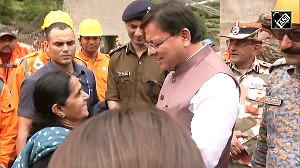 Heartfelt Gesture! Woman tears her 'Dupatta' to tie Rakhi on CM Dhami's wrist