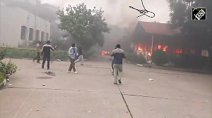 Drone Captures Massive GenZ Protests, Smoke Billowing at Nepal Parliament After PM Oli Resign
