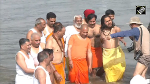 CM Yogi, his cabinet ministers take holy dip in Triveni Sangam