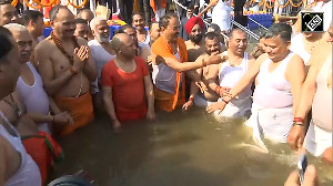 CM Yogi, cabinet ministers take holy dip in Prayagraj Sangam