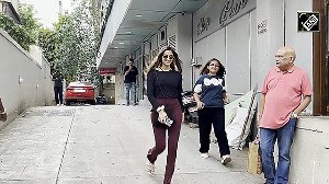 Saiee Manjrekar stuns in wine pants and sleek street style