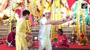 Bollywood actor Hrithik Roshan visits Sarbojanin Durga Pandal in North Bombay meets Ayan Mukherji