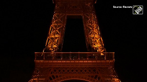 Eiffel Tower sparkles in blue and yellow to mark 3rd anniv of Ukraine war