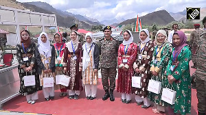 Students tie Rakhis to Army Chief Gen Upendra Dwivedi at Kargil War Memorial