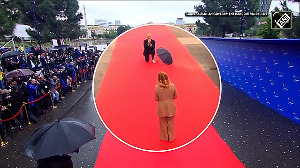 Watch: Albanian PM puts aside his umbrella, kneels in front of Georgina Meloni