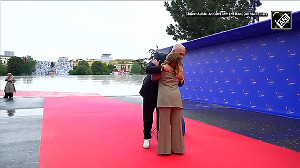 Watch: Albanian PM puts aside his umbrella, kneels in front of Georgina Meloni