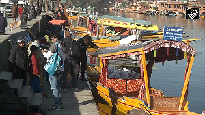 Tourists enjoy Shikara rides at Dal Lake in Srinagar