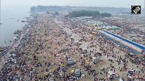 Majestic aerial view of Triveni Sangam as devotees take Amrit Snan on Mauni Amavasya