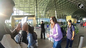 Sunny Leone spotted with her children at Mumbai airport