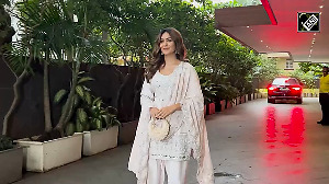 Mrunal Thakur Shines Like the Moon in an All-White Suit