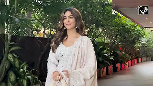 Mrunal Thakur Shines Like the Moon in an All-White Suit