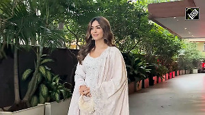Mrunal Thakur Shines Like Moon in All-White Suit