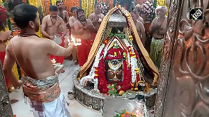 Priests perform Bhasma Aarti at the Mahakaleshwar Temple in Ujjain
