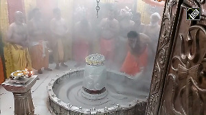 Priests perform Bhasma Aarti at the Mahakaleshwar Temple in Ujjain