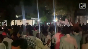 Angry RJD workers protest outside Lalu Yadav's residence
