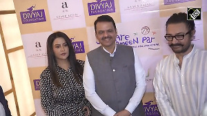 Aamir Khan welcomes CM Fadnavis, wife Amruta at screening of Sitaare Zameen Par