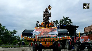 Kanwariyas carry 'Bulldozer Baba' kanwar depicting CM Yogi