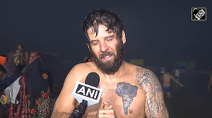 'Searching for Moksha', Brazilian devotee takes holy dip at Maha Kumbh