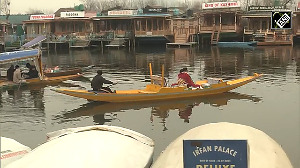 Tourists enjoy Shikara rides at Dal Lake as winter continues in Srinagar