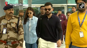 Virat-Anushka snapped at Delhi Airport 