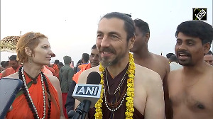 Foreign devotees embrace spirituality at Triveni Sangam