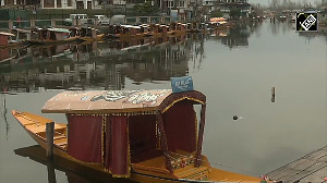 Tourists flock to Dal Lake in Srinagar to experience its serene beauty, enjoy chilly weather