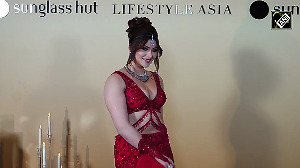 Urvashi Rautela Turns Up the Heat in a Fiery Red Ensemble