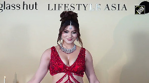 Urvashi Rautela Turns Up the Heat in a Fiery Red Ensemble