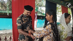 Girls tie rakhi to BSF personnel at India-Pak border