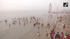 Devotees take holy dip in Ganga in Gangasagar on Makar Sankranti