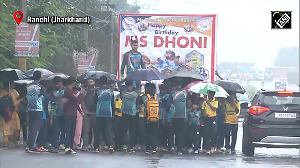 MS Dhoni's fans brave the rain to celebrate his birthday