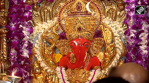 Devotees offer prayers at Siddhivinayak Temple as Ganesh Chaturthi begins