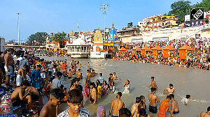 Sawan 2025: Devotees take holy dip at the Har Ki Pauri, Haridwar