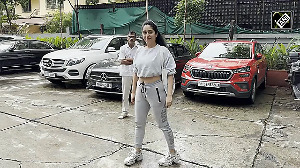 Neha Bhasin Turns Heads in Sporty Look on Mumbai Streets