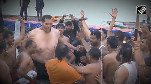 The Great Khali takes a holy dip at Maha Kumbh