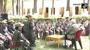 Gujarat PM Modi interacts with ground staff of Gir National Park