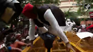Watch! Samajwadi Party MP Akhilesh Yadav jumps barricade during opposition protest
