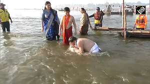 Pushkar Singh Dhami takes holy dip at Triveni Sangam with his family